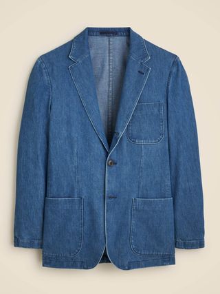 Image may contain Blazer Clothing Coat Jacket Pants and Jeans