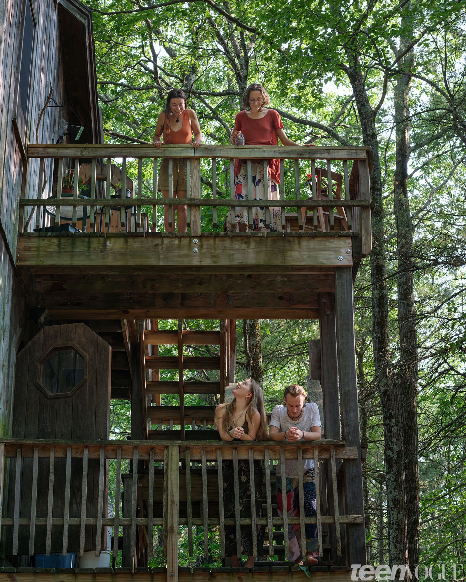 Moss and Jo photographed looking own at Madison and Gabriel on the lower deck of one of the homes on the property of...